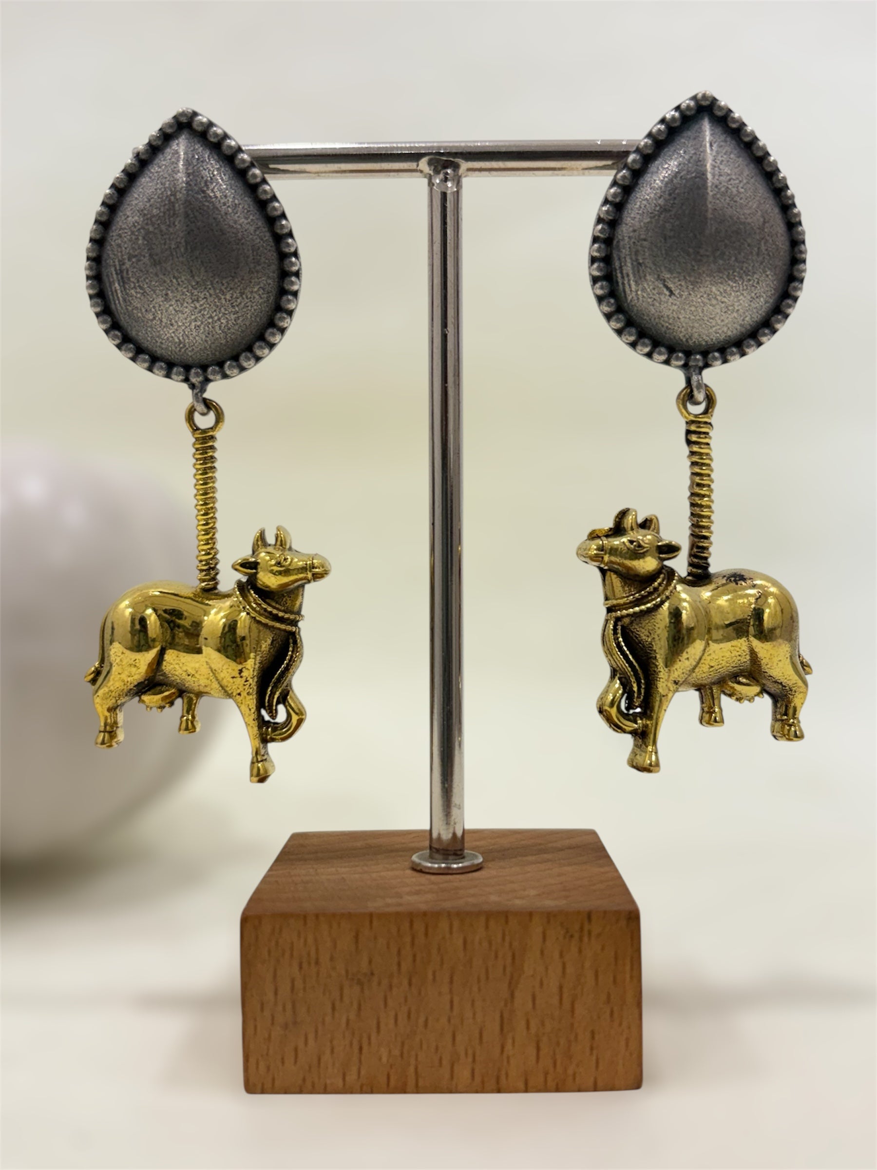 Paan Nandi Duel Tone Earrings